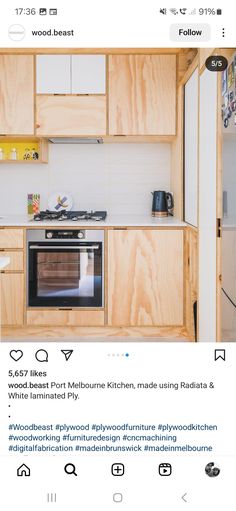 a kitchen with wooden cabinets and an oven in the middle is featured on instagram