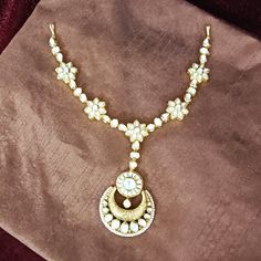 This is a beautiful Sheesh Phool / Matha Patti, made with Kundan. This work well with all types of clothing, whether it be formal attire or a casual party. Eye-catching and unique jewelry that will set you apart. Gift this piece to a loved one, and see their face light up with joy. Best for gifting or for personal use, wear it to any occasion and be in the spotlight. Formal Kundan Necklace With Cutdana For Festive Occasions, Elegant Kundan Tikka With Zari Work, Festive Formal Kundan Tikka, Formal Bollywood Kundan Necklace With Tilla, Elegant Cutdana Tikka For Festivals, Formal Dupatta With Gota Work For Festivals, Elegant Kundan Necklace With Gota Work For Festivals, Elegant Chandbali Tikka With Zari Work, Elegant Zari Work Tikka For Festivals