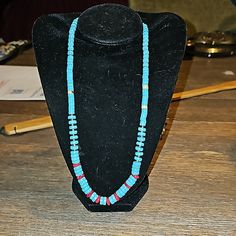 Here Is A Turquoise Dyed Howalite And Real Coral Necklace.. With Silver Toned Beaded Spacers With A Silvertone Toggle Clasp. Dyed Howalite Is Used As A Affordable Alternative To Real Turquoise.. This Is Dyed Howalite.. Which Is A Real Gemstone That Takes And Keeps Color For A Lifetime.. Small Red Coral Accent Beads.. Lays About 18 Inches Long And Is A Stunning Look When Layered.. Do You Want That Coastal Cowboy Look? Well This Is A Super Affordable Way To Achieve That.. Message Me With Any Quest Adjustable Blue Turquoise Necklace With Gemstone Beads, Adjustable Blue Turquoise Southwestern Necklace, Southwestern Blue Beaded Necklaces For Gift, Southwestern Style Blue Beaded Necklace For Gift, Traditional Blue Single Strand Necklace, Artisan Blue Turquoise Necklace With Colorful Beads, Southwestern Blue Single Strand Turquoise Necklace, Southwestern Style Blue Beaded Necklace For Beach, Southwestern Style Blue Necklace For Beach