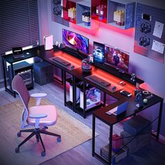 a computer desk topped with two monitors and a keyboard next to a chair in front of it