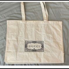 Gucci Dust Bag Tote Bag 100% Cotton Large 55cm Width - Brand New Designer Gift Bag For Everyday Use, Luxury Everyday Gift Bag, Luxury Logo Canvas Bag For Everyday Use, Beige Logo Bag For Shopping, Logo Tote Bag For Shopping, White Luxury Canvas Shopping Bag, Luxury White Canvas Shopping Bag, Canvas Shoulder Bag With Logo For Shopping, Shopping Canvas Shoulder Bag With Logo