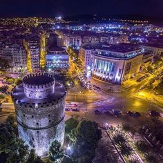 an aerial view of a city at night