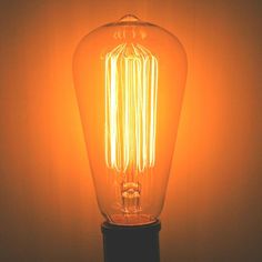 an old fashioned light bulb on a table