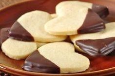 chocolate and white heart shaped cookies on a plate