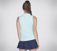 the back view of a woman wearing a light blue top