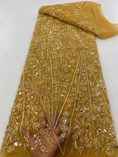 Yellow Embroidered Fabric With Intricate Details For Party, Elegant Yellow Embroidered Fabric, Elegant Yellow Fabric With Intricate Embroidery, Gold Sequin Fabric With Rhinestones For Wedding, Yellow Embellished Embroidered Fabric For Party, Elegant Embroidered Fabric With Rhinestones For Festive Occasions, Elegant Embroidered Fabric With Rhinestones For Festive Season, Yellow Fitted Embroidered Fabric For Wedding, Fitted Yellow Embroidered Fabric For Wedding