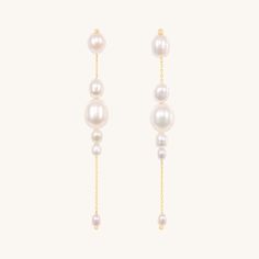 Elegant, and a little unexpected. A cascade of pearls, suspended with 14k gold. An easy addition to everyday, or suited to a special occasion. Diamond Signet Ring, Pearl And Diamond Necklace, Hoops Gold, Pearl Dangle Earrings, Jewelry Pearl, Locket Charms, Detailed Ring, Pearl Earrings Dangle, Pearl Gemstone