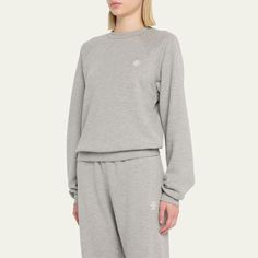 Éterne shrunken sweatshirt in cozy French terry Crew neckline Long raglan sleeves Embroidered chest logo emblem Slim fit Banded cuffs and hem Pullover style Cotton/modal Made in USA from imported materials Classic Sweatshirt With Ribbed Cuffs For Loungewear, Cozy Crew Sweats, Classic Long Sleeve Sweats For Loungewear, Classic Tops With Ribbed Cuffs For Loungewear, Sporty Sweater With Ribbed Waistband, Classic Loungewear Tops With Ribbed Cuffs, Sporty Sweatshirt With Raglan Sleeve And Ribbed Cuffs, Classic Long Sleeve Sweatshirt For Loungewear, Sporty Raglan Sleeve Sweater With Ribbed Cuffs