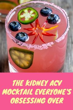 the kidney acv cocktail has blueberries, cucumber and kiwi slices on it