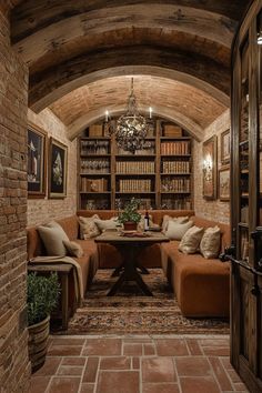 luxurious italian basement with courtyard design featuring arched windows overlooking garden rustic stone walls wrought iron details and indoor olive tree Rustic Villa Interior Design, Italian Basement, Historical Homes Interior, Tuscan Villa Interior Decor, Italian Home Interior, Tuscan House Interior, Italian House Interior, Tuscan Interior Design, Italian Inspired Home