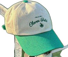 Sporty Logo Print Baseball Cap, Sporty Baseball Cap With Logo Print, Sporty Visor Hat With Logo Print, Sporty Green Baseball Cap With Embroidered Logo, Green Sporty Baseball Cap With Embroidered Logo, Casual Baseball Cap With Cotton Sweatband For Streetwear, Green Casual Baseball Cap For Sports, Sporty Green Cotton Baseball Cap, Green Sports Baseball Cap