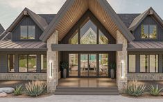 the front entrance to a large house with stone and wood trimmings on it