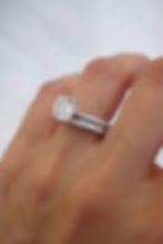 a woman's hand with a ring on it