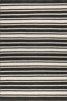 a black and white rug with horizontal stripes