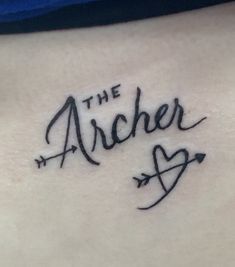 the word'the archer'written in cursive writing on a woman's stomach