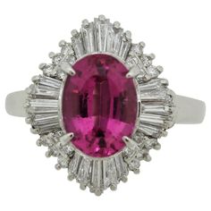 For Sale on 1stDibs - A sweet ring featuring a fine gem tourmaline. It weighs 2.58 carats and has a superb bright and vibrant reddish-pink color that dances in the light. It Luxury Pink Ruby Ring In Platinum, Formal Gia Certified Pink Gemstones, Pink Platinum Ruby Ring, Classic Pink Gemstones For Formal Occasions, Elegant Pink Ruby Gemstones, Pink Ruby Ring With Platinum, Pink Gemstones For Formal Occasions, Pink Gemstones For Formal Fine Jewelry, Classic Pink Ruby Rings