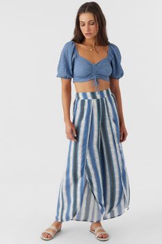 Laid-back, flowy woven pant that radiates effortless style. It features an elastic waist, wider fit and split leg detail. O'Neill Women's woven pant 28" Inseam 12.5" Front rise Elastic waist Wide leg fit Split leg detail 100% Viscose Cropped Bottoms For Beach Season, Spring Cropped Beachwear Bottoms, Summer Cropped Beach Bottoms, Cropped Summer Bottoms For Beach, Cropped Summer Beach Bottoms, Chic Split Pants For Vacation, Flowy Beach Bottoms With Elastic Waistband, Summer Vacation Cropped Bottoms, Casual Summer Bottoms With Split Design