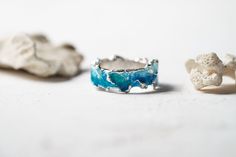 Beautiful ring Wave will bring you back to the sea! This ring is unique! Using hot enamel technique every item receives his own unique texture! https://www.etsy.com/listing/559371911/ - Wide wave ring (10 mm) Details: Width: 5mm Thickness: 1.2 mm Materials: sterling silver 925, hot vitreous enamel These rings in gold: https://www.etsy.com/listing/932462309/ - Gold blue wave https://www.etsy.com/listing/932465221/ - Gold green wave Please provide me size of the ring during the order, thank you! T Xmas Ring, Engagement Rings Blue, Etsy Engagement Rings, Unique Wedding Rings, Rings Blue, Rings Anniversary, Blue Engagement Ring, Green Ring, Vitreous Enamel