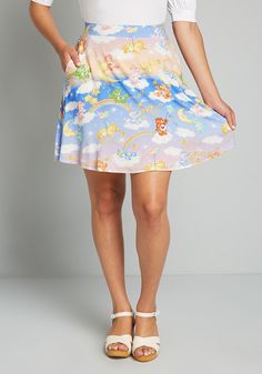 An 80’s inspired delight from our ModCloth X Care Bears collab, this A-line skirt boasts an exclusive hand-drawn print of all your favorite Care Bears resting on fluffy white clouds, sliding down rainbows, hanging from the crescent moon, and socializing with the stars atop a blue and pink ombre background ! Made from a soft and stretchy viscose-blend fabric and featuring a comfortable elasticized waist, and a swingy silhouette, this darling mini skirt is always a sweet choice ! 95% Rayon / 5% Sp Pink Ombre Background, Vintage Style Swimwear, Plus Size Vintage Clothing, Designer Plus Size Clothing, Ombre Background, Casual Dresses Plus Size, Midi Dress Plus Size, Vintage Swimwear, Kawaii Accessories