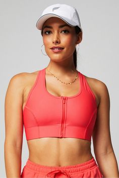 On-The-Go Zip Medium Impact Sports Bra Fabletics orange female Activewear >> Womens >> Sports Bras >> Sports Bras regular Training External Pockets/Moisture-Wicking/Removable Bra Cups Functional Orange Sports Bra For Workout, Orange Sports Bra For Yoga, Functional Orange Sports Bra For Training, Orange Sporty Sports Bra For Yoga, Sporty Orange Sports Bra For Yoga, Casual Orange Sports Bra For Gym, Orange Stretch Athleisure Sports Bra, Orange Athleisure Sports Bra With Stretch, Orange Athleisure Sports Bra For Yoga