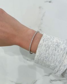 This classic, streamlined bangle is a no-brainer addition to your jewelry collection. Beautiful stacked or solo, it's bound to become your new signature. Necklace Length Guide, Bracelet Size Chart, Hinged Bracelet, Diamond Bangle, Bezel Diamond, Engagement Ring Wedding Band, Emerald Ring, Bracelet Sizes, Wedding Ring Bands