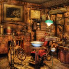 an old fashioned kitchen with lots of wooden furniture