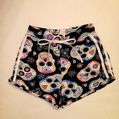 Black Pajamas Shorts With Multi- Colored Skulls On Them. In Brand New Shape Never Been Worn. Size Small. Skull Pajamas, Fuzzy Pajama Pants, Lounge Wear Summer, White Jogger Pants, Pajamas Shorts, Christmas Pajama Pants, Black Pajamas, Red Pajamas, Onesie Pajamas