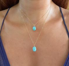 "Gorgeous Larimar Oval Pendant Necklace. These are AAA quality Larimar from the Dominican Republic. Each Larimar piece is unique and beautiful. Pendants are 24k gold plated just around the edges so that the Larimar touches the skin. Chains are gold fill. This listing is for one necklace. Chose from the shorter 16-18\" adjustable chain length or the 20\" length! Get one or a few to layer together! About the crystals: All crystals and gemstones are carefully chosen by myself from several vendors I Larimar Crystal Meaning, Larimar Necklace, Larimar Jewelry, Pretty Jewelry Necklaces, Larimar Pendant, Larimar Stone, Oval Necklace, Stylish Bracelet, Jewelry Outfit