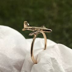 Welcome to our handmade jewellery shop! This rings is 14k gold! This Airplane Rings is a perfect gift for a flight attendant, a pilot and a person who love to travel! In our workshop, the most important task is to make strong and reliable jewelry that will last you more than one year! Our accessories will be your consistent choice either it's an anniversary, birthday, or any other special occasion, because all of our jewelry are custom made by hand with LOVE and CARE! All of our jewelry is handm Airplane Ring, Aviation Jewelry, Airplane Jewelry, Travel Ring, Travel Bracelet, Gold Finger Rings, Gold Rings Simple, Jewellery Shop, Cute Rings