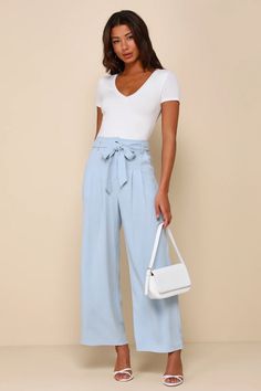 Look like a page out of style section in the Lulus Trend Alert Light Blue Belted High-Waisted Wide-Leg Pants! Linen-blend woven fabric shapes these breezy pants that have a high-waisted fit with belt loops and a sash belt. The wide legs have tailored pleating, side pockets, and end at ankle-length hems. Top button and hidden zipper fly. High Waist Light Blue Wide Leg Pants For Spring, Light Blue High Waist Wide Leg Pants For Spring, Blue Ankle-length Wide Leg Pants For Summer, Chic High Waist Light Blue Wide Leg Pants, High Waist Light Blue Pants For Spring, Light Blue High Waist Pants For Spring, Chic Light Blue Pants For Day Out, Elegant Light Blue Pants For Summer, Elegant Light Blue Summer Pants