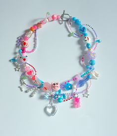 the bracelet is decorated with charms and beads