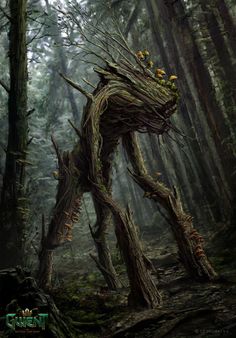 an animal made out of branches in the woods with moss growing on it's back