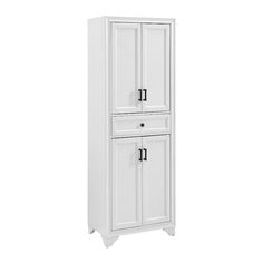 a tall white cabinet with two doors on the front and one door open to reveal a drawer