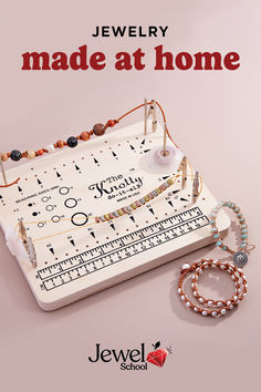 jewelry made at home is displayed on a white tray with beads and beaded bracelets