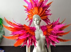 Ares Alexander Feather shoulder piece and headdress Feathers are the best quality of bright color cocktail feathers and nandu feathers Available in most colors and color combinations Made in the USA and ship from the USA We make and ship our items really fast if you need them for a specific date please let us know. or call/text us at 954-3051817 to complete your order over the phone An elastic harness keeps the shoulder piece securely in place Glitter Elastic Band that matches the color of the c Carnival Costumes Ideas Women Outfit, Feather Shoulders, Carnival Feathers, Headdress Feather, Carnival Headdress, Elastic Harness, Bright Colors Fashion, Carnival Parade, Shoulder Piece