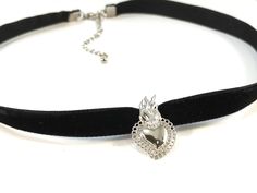 Handcrafted choker, 38 cm long velvet cord, stainless steel charm. Each item comes in a gift box, ready to be gifted or given to yourself! Contact me, and I will create a customized item for you. Shipping to Italy - Priority post, delivery in 3 to 5 working days EU - Priority post delivery in 14 to 21 working days U.S - Priority post delivered in 21 to 31 working days IMPORTANT This type of shipment does not have a code to track your package step by step, if you want a traceable shipment the cos Gothic Heart Charm Choker Jewelry, Nickel-free Black Choker As A Gift, Gothic Jewelry With Charms, Adjustable Heart Charm Choker For Gift, Adjustable Heart Charm Choker As Gift, Gothic Silver Jewelry With Heart Charm, Gothic Sterling Silver Choker Jewelry, Adjustable Choker With Heart Charm For Gift, Gothic Sterling Silver Choker