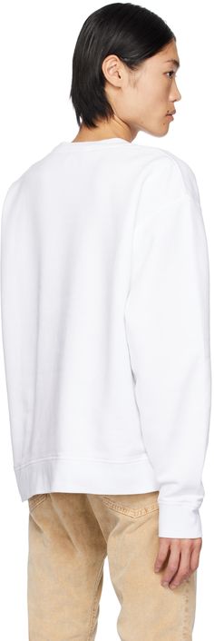 Cotton fleece sweatshirt. · Rib knit crewneck, hem, and cuffs · Logo, graphic, and text printed at front Supplier color: White Classic White Sweatshirt For Loungewear, White Crew Sweatshirt With Ribbed Collar, Classic White Sweater With Letter Print, Classic White Letter Print Sweater, White Crew Neck Sweatshirt With Ribbed Collar, White Crew Sweatshirt With Ribbed Cuffs, White Hoodie With Ribbed Collar For Streetwear, White Crew Neck Sweats With Ribbed Cuffs, White Sweats With Ribbed Cuffs