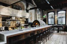 a large kitchen with an oven and lots of counter space