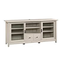 a white entertainment center with two doors and three drawers on the bottom, one door open