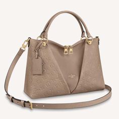 Louis Vuitton Women V Tote MM Embossed Monogram Empreinte Supple Grained Cowhide-Sandy Beige Bags, Louis Vuitton Women, Mm Monogram, Purse Collection, Leather Panel, Lv Bags, Model Features, Classic Bags, Louis Vuitton Official