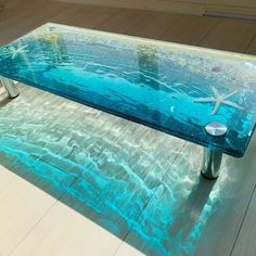 a glass table with starfish on it