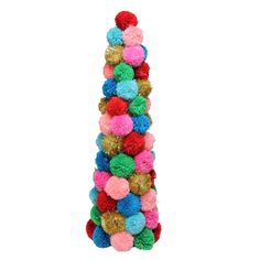 multicolored pom - poms hanging from the top of a tall pole