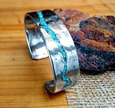 * Turquoise Inlay Stainless Cuff Bracelet. * 3mm Thickness 18mm Wide. Hammered and Polished. * Mark your wrist size on the option. Other sizes, please contact. Bronze Bracelets, Inlaid Jewelry, Copper Cuff Bracelet, Copper Cuff, Turquoise Bracelet Cuff, Turquoise Cuff, Sterling Silver Cuff Bracelet, Bracelet Cuff, Copper Bracelet