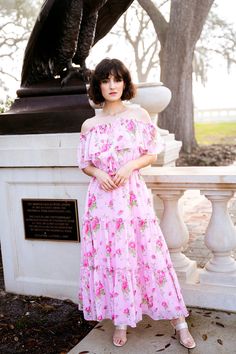 Introducing our stunning off-the-shoulder dresses in Pink Floral, the perfect addition to your wardrobe. This limited edition piece is one of our two exceptional dresses made from high-quality chiffon. This dress is perfect for any special occasion, or a sunny day out. The off-shoulder design adds a touch of elegance, while the pink floral pattern gives it a romantic feel. The inner shell is made from high-grade lining to provide comfort and coverage. Not to mention this dress is designed with a Pink Off Shoulder Summer Wedding Dress, Pink Off-shoulder Maxi Dress For Garden Party, Off-shoulder Chiffon Maxi Dress For Garden Party, Spring Flowy Off Shoulder Maxi Dress, Spring Chiffon Off Shoulder Dress For Party, Spring Party Off Shoulder Chiffon Dress, Summer Evening Off-shoulder Chiffon Dress, Off-shoulder Chiffon Dress For Summer Evenings, Off-shoulder Chiffon Dress For Summer