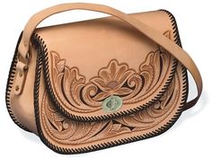 a brown purse with an intricate design on it