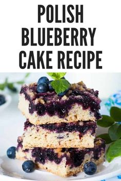 blueberry cheesecake bars stacked on top of each other with the words, polish blueberry cake recipe