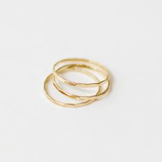 Please note:  - Etsy delivery times are only an estimate, not a guarantee.  --- A B O U T --- 14K Gold filled hammered stacking ring  Minimalist design ring perfect for stacking or wearing alone This listing is for a SINGLE hammered stacking ring, only ONE ring will be provided  --- D E T A I L S --- Material: 14K Gold Filled  1.25mm width  Nickel and lead-free All other rings can be found here:  www.etsy.com/uk/shop/TesoroLondon?ref=seller-platform-mcnav&section_id=27014436 Packaged in a cute c Everyday Stackable Rings With A Simple Design, Adjustable Simple Stackable Rings For Everyday, Adjustable Simple Design Stackable Rings For Everyday, Delicate Everyday Stackable Rings, Simple Stackable Midi Rings For Everyday, Dainty Stackable Adjustable Rings With Simple Design, Dainty Adjustable Stackable Rings For Everyday, Adjustable Dainty Stackable Rings For Everyday, Delicate Everyday Stackable Midi Rings