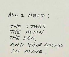 a piece of paper with writing on it that says all i need the stars the moon and your hand is mine