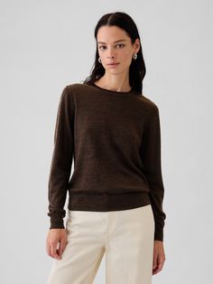 Soft wool sweater.  Crewneck.  Long sleeves.  Responsible Wool Standard certified.  Fit: Classic.  A straight & easy fit.  Hits at the hip.  Models wearing Gap Quality Wool Sweaters, Cozy Workwear Sweater At Affordable Price, Classic Womens Sweater, Black Merino Sweater, Brown Sweater Outfit, Soft Wool Sweater, Winter Sweater Outfits, Clear Spring, Family Pic