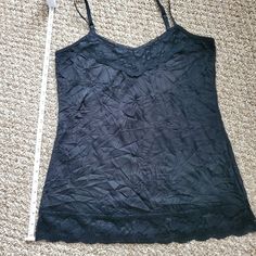 Nwot Black Spaghetti Strap Camisole Top. Never Worn Too Small. Bundle And Save I Have A White One In My Closet Too Black Lace Tops With Delicate Straps, Black Lace Camisole With Spaghetti Straps, Black Stretch Camisole With Delicate Straps, Black Lace Trim Spaghetti Strap Camisole, Black Lace V-neck Tank Top, Stretch Lace Camisole With Spaghetti Straps, Black Lace Tank Top With Spaghetti Straps, Black Lace Sleeveless Camisole, Black Lace V-neck Camisole